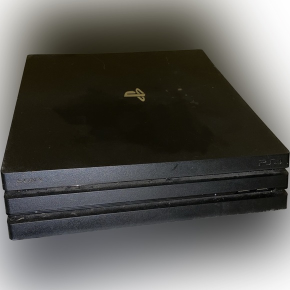 PS4 PRO 1-TB with two controllers and games included in price - Picture 2 of 4